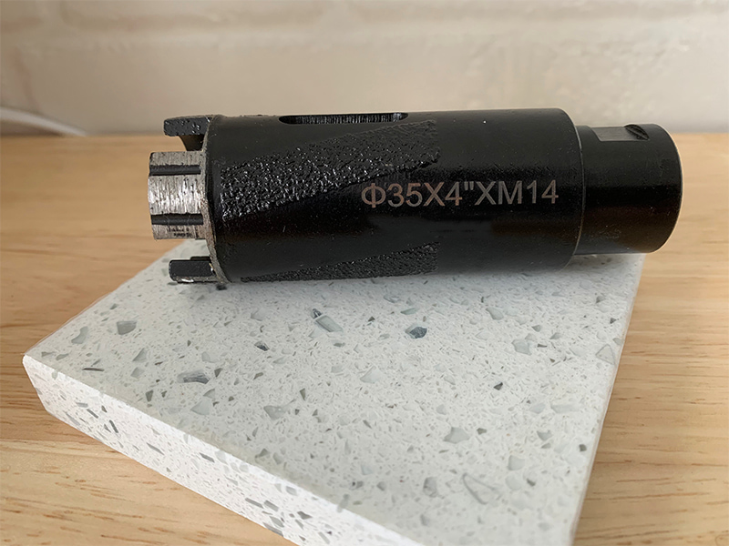 ¿Cómo perforar un agujero para grifo en piedra de granito con una máquina manual?